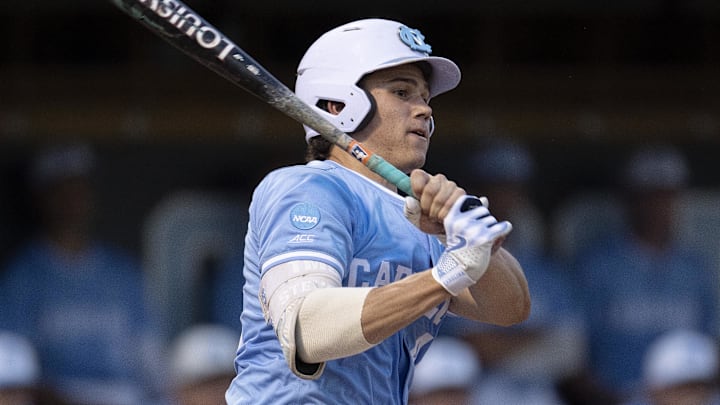 Jun 8, 2024; Chapel Hill, NC, USA; North Carolina Tar Heels Luke Stevenson (44) bats against the West Virginia Mountaineers in the second inning of the DI Baseball Super Regional at Boshamer Stadium. Mandatory Credit: Jeffrey Camarati-Imagn Images

