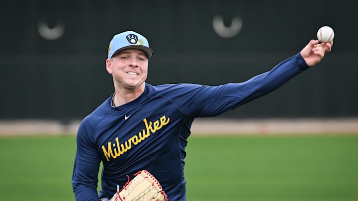 Milwaukee Brewers pitcher Kyle Harrison throws in the outfield during spring training workouts Monday, February 16, 2026, at American Family Fields of Phoenix in Phoenix, Arizona.