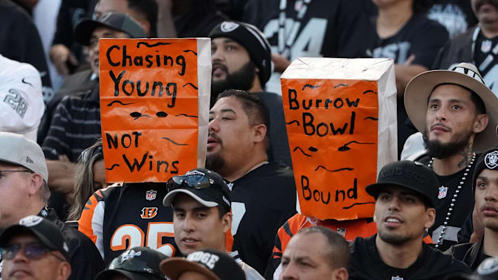 Nov 17, 2019; Oakland, CA, USA; Cincinnati Bengals fans wear Orange bags on their heads in the fourth quarter against the Oakland Raiders at Oakland-Alameda County Coliseum. The Raiders defeated the Bengals 17-10.  Mandatory Credit: Kirby Lee-Imagn Images