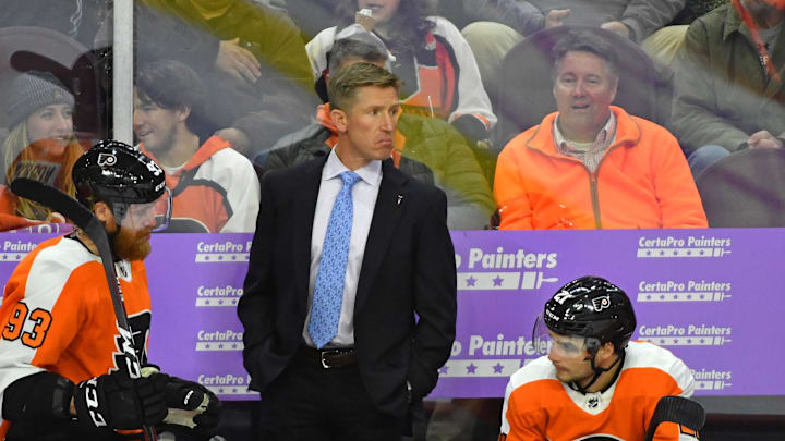 Nov 27, 2018; Philadelphia, PA, USA; Philadelphia Flyers head coach Dave Hakstol behind the bench against the Ottawa Senators during the third period at Wells Fargo Center.