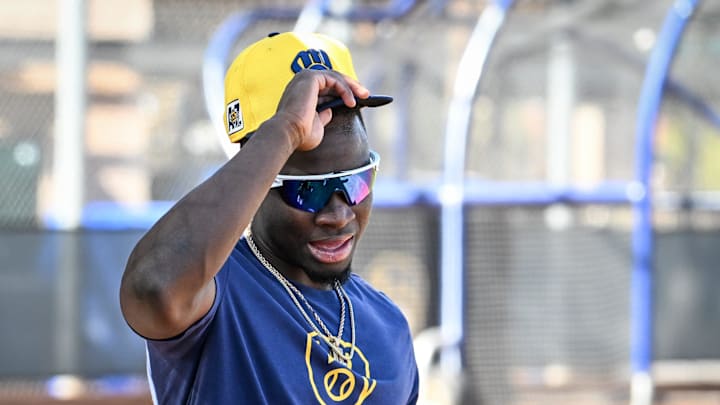 Milwaukee Brewers outfielder Luis Lara walks to the field during spring training workouts Tuesday, February 18, 2025, at American Family Fields of Phoenix in Phoenix, Arizona.