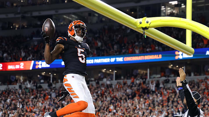 Dec 28, 2024; Cincinnati, Ohio, USA; Cincinnati Bengals wide receiver Tee Higgins (5) celebrates after making a touchdown pass reception against the Denver Broncos during the second quarter at Paycor Stadium. Mandatory Credit: Joseph Maiorana-Imagn Images Dec 28, 2024; Cincinnati, Ohio, USA; Cincinnati Bengals wide receiver Tee Higgins (5) celebrates after making a touchdown pass reception against the Denver Broncos during the second quarter at Paycor Stadium. Mandatory Credit: Joseph Maiorana-Imagn Images