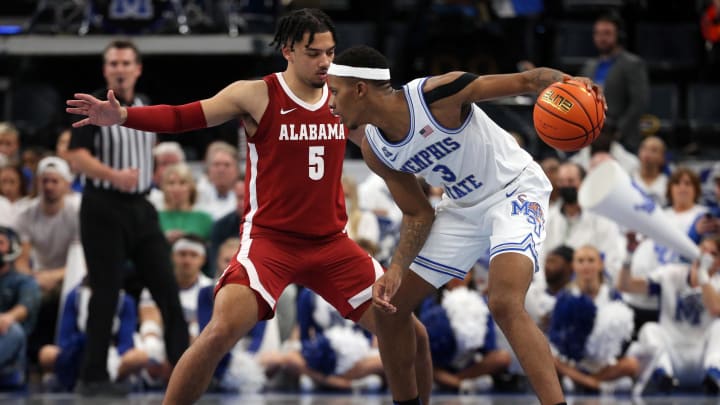 Dec 14, 2021; Memphis, Tennessee, USA; Memphis Tigers guard Landers Nolley II (3) dribbles as Alabama Crimson Tide guard Jaden Shackelford (5) defends during the second half at FedExForum. Mandatory Credit: Petre Thomas-USA TODAY Sports