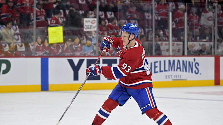 Apr 25, 2025; Montreal, Quebec, CAN; Montreal Canadiens forward Ivan Demidov (93) shoots the puck during the warmup period in game three of the first round of the 2025 Stanley Cup Playoffs against the Washington Capitals at the Bell Centre. Mandatory Credit: Eric Bolte-Imagn Images