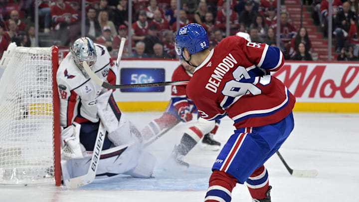 Apr 25, 2025; Montreal, Quebec, CAN; Washington Capitals goalie Logan Thompson (48) makes a save against Montreal Canadiens forward Ivan Demidov (93) during the second period in game three of the first round of the 2025 Stanley Cup Playoffs at the Bell Centre. Mandatory Credit: Eric Bolte-Imagn Images