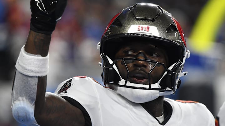 Sep 15, 2024; Detroit, Michigan, USA; Tampa Bay Buccaneers wide receiver Chris Godwin (14) celebrates after scoring a touchdown against the Detroit Lions in the second quarter at Ford Field. Mandatory Credit: Eamon Horwedel-Imagn Images