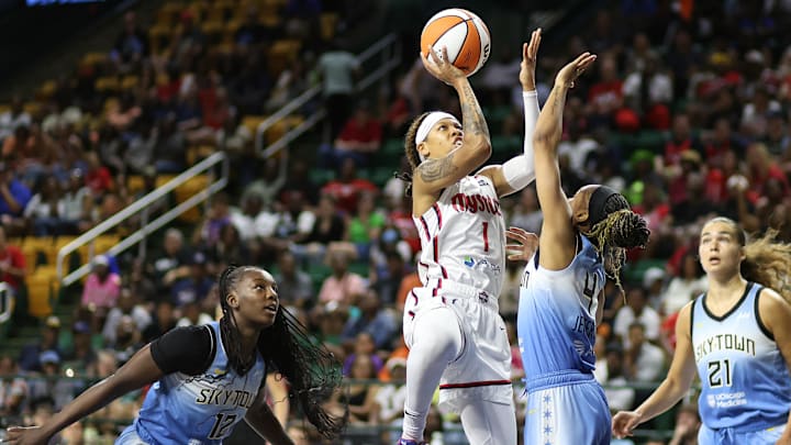 Jul 8, 2025; Fairfax, Virginia, USA; Washington Mystics guard Sug Sutton (1) takes a shot over Chicago Sky guard Moriah Jefferson (4) during the first half at EagleBank Arena. Mandatory Credit: Daniel Kucin Jr.-Imagn Images