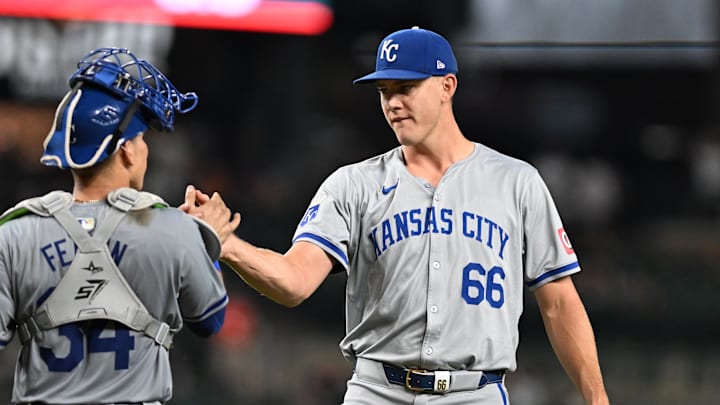 Kansas City Royals pitcher James McArthur (66) celebrates with catcher Freddy Fermin (34) after defeating the Detroit Tigers at Comerica Park on Aug 2.