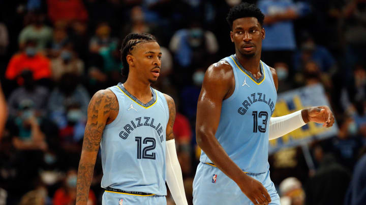 Oct 20, 2021; Memphis, Tennessee, USA; Memphis Grizzles guard Ja Morant (12) and Memphis Grizzles forward Jaren Jackson Jr. (13) talk after a time-out during the second half against the Cleveland Cavaliers at FedExForum. Mandatory Credit: Petre Thomas-USA TODAY Sports