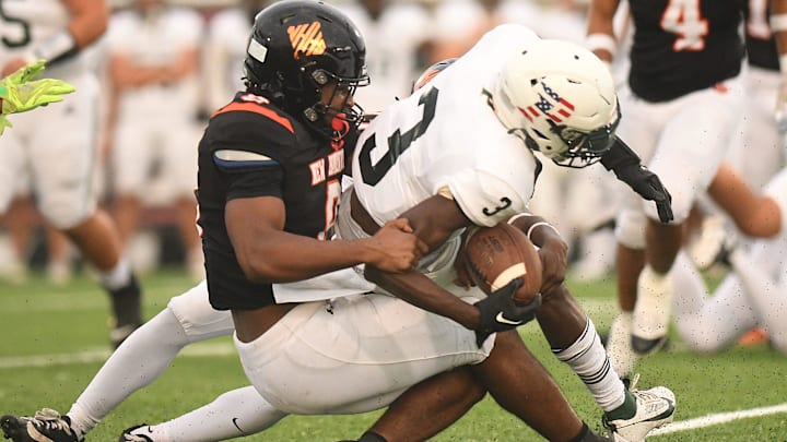 Pinecrest's Zymire Spencer (3) lunges for additional yardage in a game against New Hanover on Friday Sept. 13, 2024 at Legion Stadium in Wilmington, N.C. He passed for 243 yards and two scores last week against Leesville, in the CAP-6 Conference Championship Game, to earn a nomination as North Carolina High School Football Player of the Week.