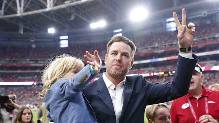 Former Arizona Cardinals quarterback Carson Palmer waves to the crowd after his Ring of Honor induction ceremony during halftime against the Seattle Seahawks September 29, 2019. Former Arizona Cardinals quarterback Carson Palmer waves to the crowd after his Ring of Honor induction ceremony during halftime against the Seattle Seahawks September 29, 2019.