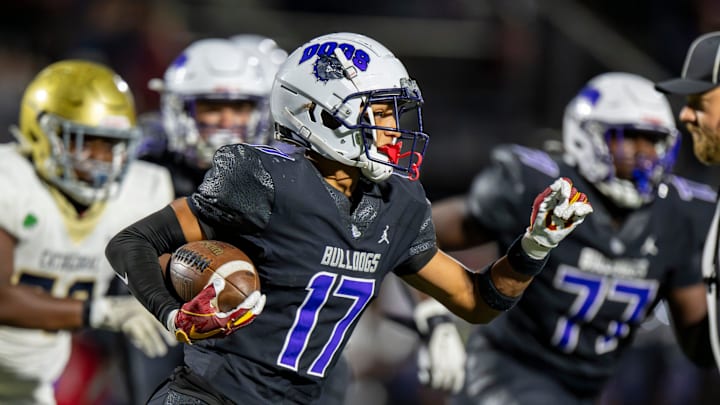 Brownsburg High School junior Chancelor Adams (17) runs an interception up field during the second half of an IHSAA varsity football game against Indianapolis Cathedral High School, Friday, Aug. 29, 2025, at Brownsburg High School. Brownsburg High School junior Chancelor Adams (17) runs an interception up field during the second half of an IHSAA varsity football game against Indianapolis Cathedral High School, Friday, Aug. 29, 2025, at Brownsburg High School.
