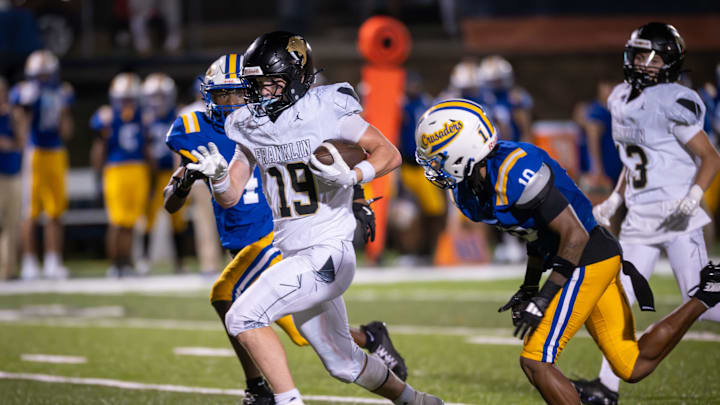 Franklin running back Robbie Beglinger (19) breaks through for a long run against Catholic Memorial in a game Friday, August 22, 2025, at Schneider Stadium in Waukesha, Wisconsin.