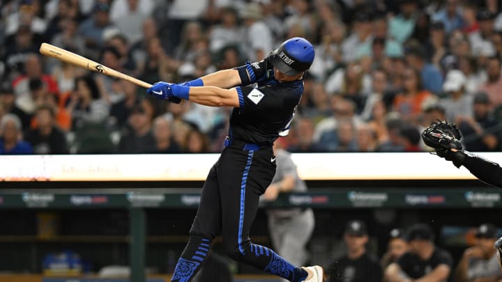 Aug 16, 2024; Detroit, Michigan, USA;  Detroit Tigers shortstop Trey Sweeney (27) hits a single against the New York Yankees in the sixth inning in his Major League debut at Comerica Park. Mandatory Credit: Lon Horwedel-USA TODAY Sports