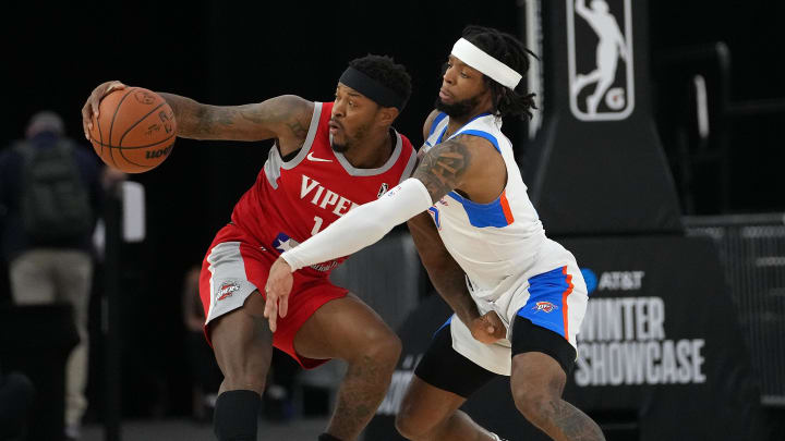 Dec 19, 2021; Las Vegas, NV, USA; Rio Grande Valley Vipers guard Marcus Foster (17) protects the ball from Oklahoma City Blue guard Zavier Simpson (5) during the second quarter at Mandalay Bay Convention Center. Mandatory Credit: Stephen R. Sylvanie-USA TODAY Sports