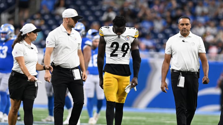 Aug 24, 2024; Detroit, Michigan, USA; Pittsburgh Steelers cornerback Ryan Watts (29) walks off the field after being injured against the Detroit Lions late in the fourth quarter at Ford Field. Mandatory Credit: Lon Horwedel-USA TODAY Sports