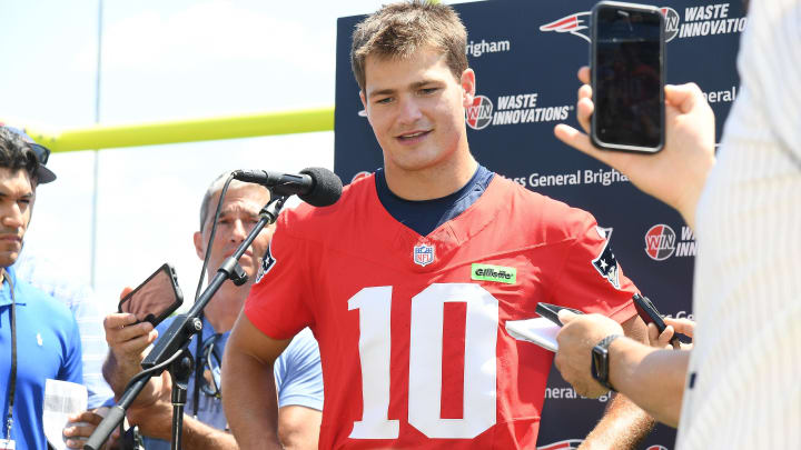 Jul 26, 2024; Foxborough, MA, USA; New England Patriots quarterback Drake Maye (10) holds a press conference at training camp at Gillette Stadium. Mandatory Credit: Eric Canha-USA TODAY Sports