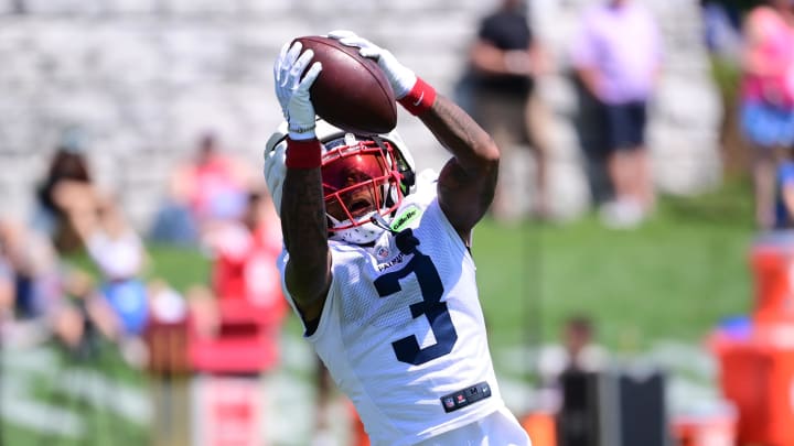 Jul 26, 2024; Foxborough, MA, USA; New England Patriots wide receiver DeMario Douglas (3) makes a catch during training camp at Gillette Stadium. Mandatory Credit: Eric Canha-USA TODAY Sports