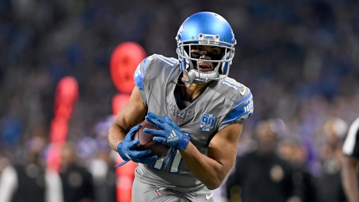 Jan 7, 2024; Detroit, Michigan, USA; Detroit Lions wide receiver Kalif Raymond (11) runs up the sidelines after catching a pass against the  Minnesota Vikings quarterback in the first quarter at Ford Field. Mandatory Credit: Lon Horwedel-USA TODAY Sports