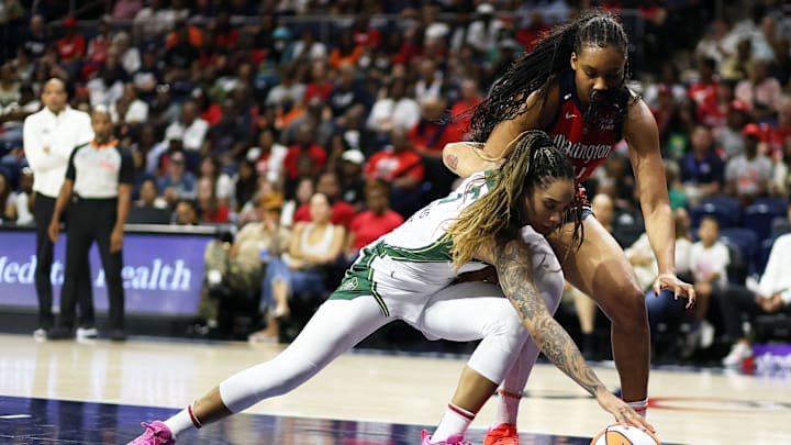 Aug 24, 2025; Washington, District of Columbia, USA; Seattle Storm forward Gabby Williams (5) streals the ball away from Washington Mystics during the second half at CareFirst Arena. Mandatory Credit: Daniel Kucin Jr.-Imagn Images
