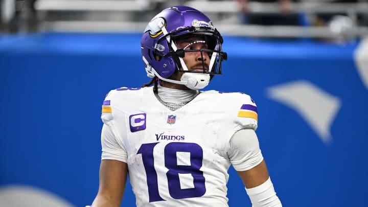 Jan 7, 2024; Detroit, Michigan, USA; Minnesota Vikings wide receiver Justin Jefferson (18) looks up into the crowd after scoring a touchdown against the Detroit Lions in the third quarter at Ford Field. Mandatory Credit: Lon Horwedel-USA TODAY Sports Jan 7, 2024; Detroit, Michigan, USA; Minnesota Vikings wide receiver Justin Jefferson (18) looks up into the crowd after scoring a touchdown against the Detroit Lions in the third quarter at Ford Field. Mandatory Credit: Lon Horwedel-USA TODAY Sports