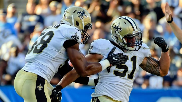 Aug 20, 2017; Carson, CA, USA; New Orleans Saints linebacker Manti Te'o (51) celebrates after sacking Los Angeles Chargers quarterback Kellen Clemens (10) (not pictured) with teammate Saints defensive end Obum Gwacham (58) during a NFL football game at StubHub Center. Mandatory Credit: Kirby Lee-USA TODAY Sports