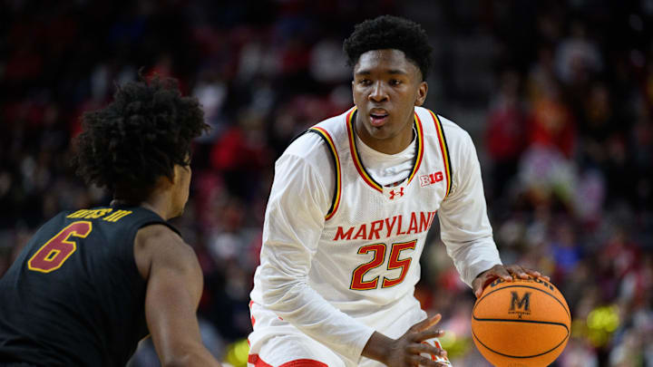 Feb 20, 2025; College Park, Maryland, USA; Maryland Terrapins center Derik Queen (25) handles the ball during the second half against USC Trojans guard Wesley Yates III (6) at Xfinity Center. Mandatory Credit: Reggie Hildred-Imagn Images Feb 20, 2025; College Park, Maryland, USA; Maryland Terrapins center Derik Queen (25) handles the ball during the second half against USC Trojans guard Wesley Yates III (6) at Xfinity Center. Mandatory Credit: Reggie Hildred-Imagn Images