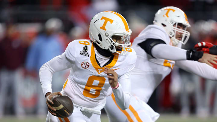 Iamaleava looks to pass during a game. 