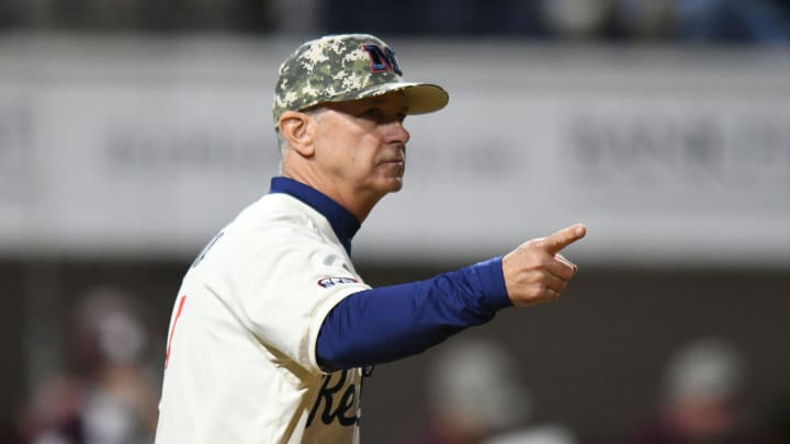 Ole Miss head coach Mike Bianco (5) makes a pitching change against Mississippi State at Swayze Field in Oxford, Miss., on Friday, Apr. 12, 2024.