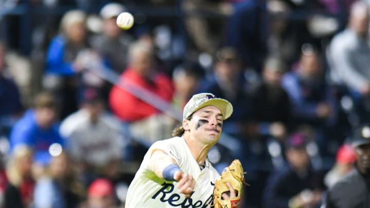 Ole Miss infielder Andrew Fischer (3) makes an error on a throw in the 5th inning at Swayze Field in Oxford, Miss., on Friday, Apr. 12, 2024.