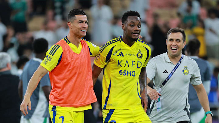 Al Nassr players Jhon Duran and Cristiano Ronaldo celebrate after a Saudi Pro League match Al Nassr players Jhon Duran and Cristiano Ronaldo celebrate after a Saudi Pro League match