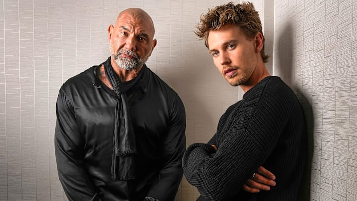 Dave Bautista, left, plays the evil Glossu Rabban Harkonnen and Austin Butler plays his equally evil brother Feyd-Rautha Harkonnen in \"Dune: Part Two.   