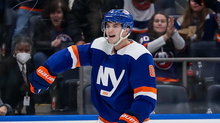 Apr 6, 2024; Elmont, New York, USA; New York Islanders defenseman Noah Dobson (8) celebrates after