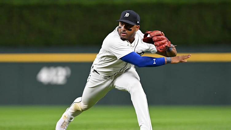 Sep 29, 2023; Detroit, Michigan, USA; Detroit Tigers second baseman Andy Ibanez (77) throws the ball