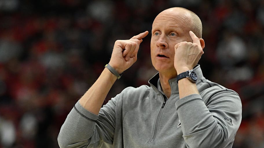 Louisville Cardinals head coach Chris Mack gives instructions on the sideline during the first half against Notre Dame.