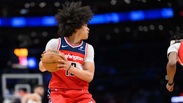 Feb 7, 2025; Washington, District of Columbia, USA; Washington Wizards forward Kyshawn George (18) grabs a rebound during the third quarter against the Cleveland Cavaliers at Capital One Arena. Mandatory Credit: Reggie Hildred-Imagn Images