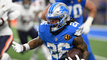 Nov 28, 2024; Detroit, Michigan, USA; Detroit Lions running back Jahmyr Gibbs (26) runs the ball against the Chicago Bears in the first quarter at Ford Field.