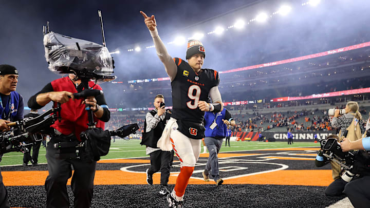 Dec 28, 2024; Cincinnati, Ohio, USA;  Cincinnati Bengals quarterback Joe Burrow (9) celebrates following the overtime win against the Denver Broncos at Paycor Stadium. Mandatory Credit: Joseph Maiorana-Imagn Images