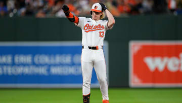 Jun 30, 2024; Baltimore, Maryland, USA; Baltimore Orioles outfielder Heston Kjerstad (13) reacts after hitting a double during the fourth inning against the Texas Rangers at Oriole Park at Camden Yards.