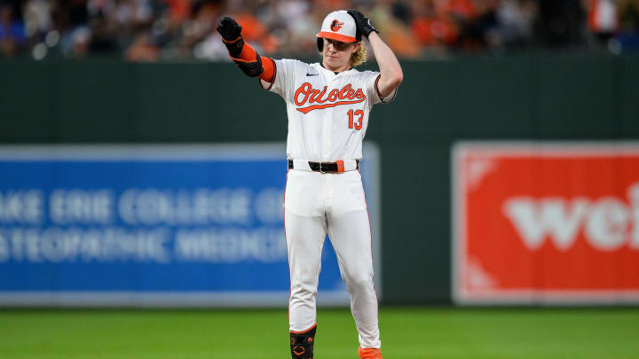 Jun 30, 2024; Baltimore, Maryland, USA; Baltimore Orioles outfielder Heston Kjerstad (13) reacts after hitting a double during the fourth inning against the Texas Rangers at Oriole Park at Camden Yards.