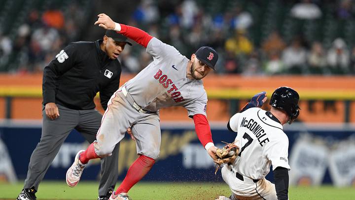 May 5, 2026; Detroit, Michigan, USA; Detroit Tigers shortstop Kevin McGonigle (7) steals second base ahead of the throw to Boston Red Sox shortstop Trevor Story (10) in the seventh inning at Comerica Park. Mandatory Credit: Lon Horwedel-Imagn Images