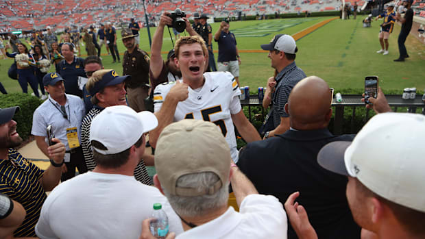 Quarterback Fernando Mendoza celebrates with Cal fans