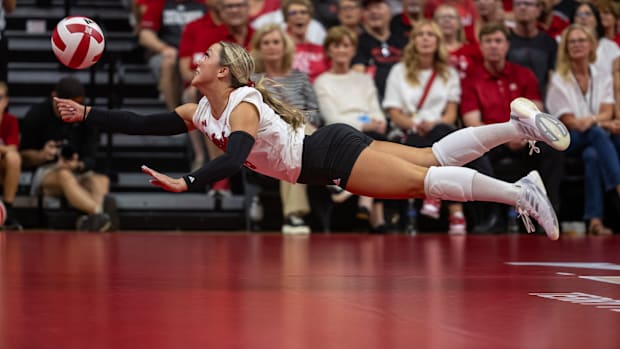 Nebraska volleyball defensive specialist Laney Choboy dives to dig a ball against Stanford at the Bob Devaney Sports Center.