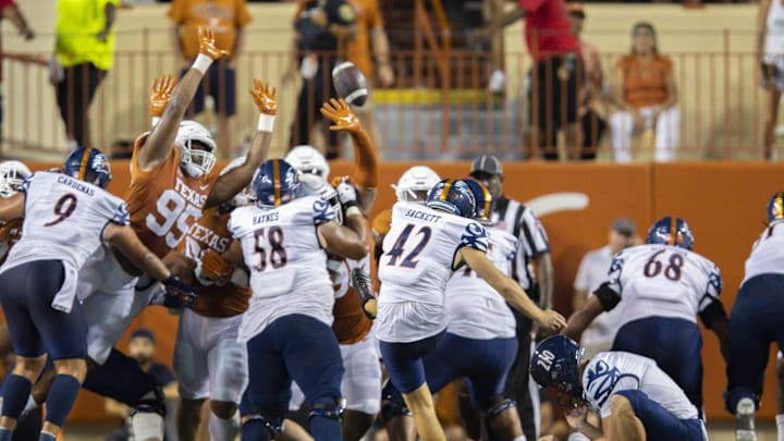 Sep 17, 2022; Austin, Texas, USA; UTSA Roadrunners kicker Jared Sackett (42) kicks a field goal against the Texas Longhorns during the third quarter at Darrell K Royal-Texas Memorial Stadium. Mandatory Credit: John Gutierrez-Imagn Images