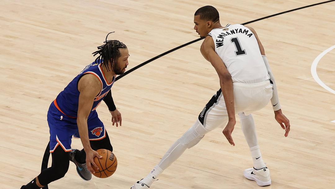 Jun 5, 2026; San Antonio, Texas, USA; New York Knicks guard Jalen Brunson (11) dribbles the ball against San Antonio Spurs forward Victor Wembanyama (1) 