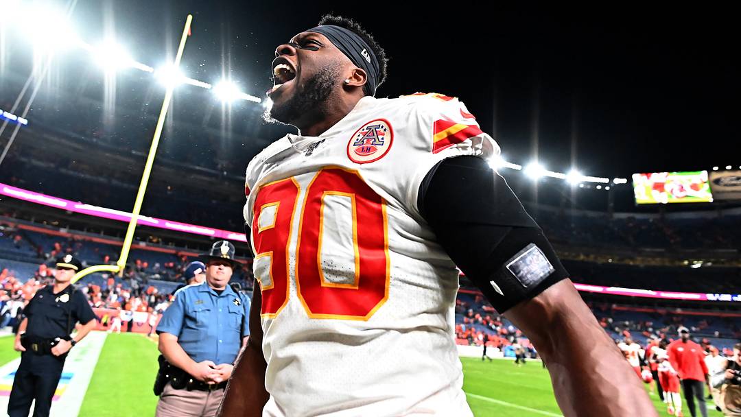 Oct 17, 2019; Denver, CO, USA; Kansas City Chiefs defensive end Emmanuel Ogbah (90) reacts following the win over the Denver Broncos at Empower Field at Mile High. Mandatory Credit: Ron Chenoy-USA TODAY Sports