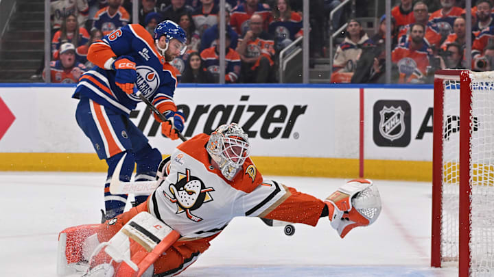Apr 20, 2026; Edmonton, Alberta, CAN; Edmonton Oilers center Jason Dickinson (16) shoots the puck to Anaheim Ducks goalie Lukas Dostal (1) in game one of the first round of the 2026 Stanley Cup Playoffs during the first period at Rogers Place. Mandatory Credit: Walter Tychnowicz-Imagn Images