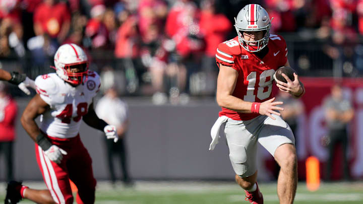Ohio State Buckeyes quarterback Will Howard runs the ball against the Nebraska Cornhuskers during the fourth quarter of their game at Ohio Stadium. Ohio State Buckeyes quarterback Will Howard runs the ball against the Nebraska Cornhuskers during the fourth quarter of their game at Ohio Stadium.