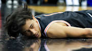 Dec 21, 2024; Newark, New Jersey, USA; Princeton Tigers guard Xaivian Lee (1) falls to the floor during the second half against Rutgers Scarlet Knights at Prudential Center. Mandatory Credit: Tom Horak-Imagn Images