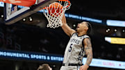 Feb 19, 2025; Washington, District of Columbia, USA; Georgetown Hoyas guard Micah Peavy (5) dunks during the first half against the Providence Friars at Capital One Arena. Mandatory Credit: Daniel Kucin Jr.-Imagn Images